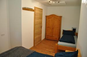 Postel nebo postele na pokoji v ubytování Ferienwohnung Staudach, Apartment