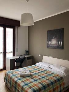 Postel nebo postele na pokoji v ubytování Guest House Brianza Room