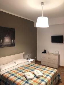 Postel nebo postele na pokoji v ubytování Guest House Brianza Room