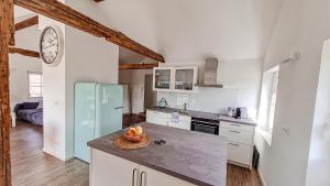 Kuchyň nebo kuchyňský kout v ubytování Penthouse im Dachgeschoss