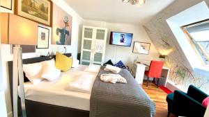 TV a/nebo společenská místnost v ubytování Lilis kleines Hotel