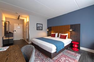 Postel nebo postele na pokoji v ubytování Hotel De Bilderberg