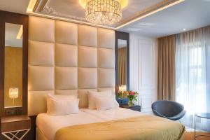 Posteľ alebo postele v izbe v ubytovaní Grand Focus Hotel Szczecin