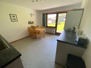 Kuchyň nebo kuchyňský kout v ubytování Apartments Carmena