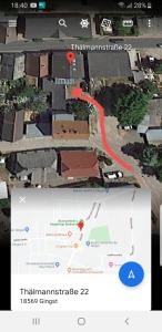 un mapa de una calle con una línea roja en Appartmenthaus Gingst, en Gingst