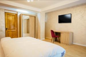 TV o dispositivi per l'intrattenimento presso Hotel Mestia Inn
