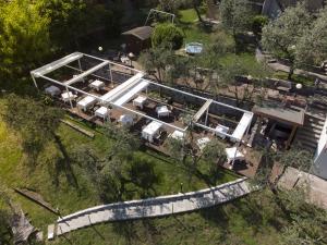 Vonkajšia záhrada v ubytovaní Hotel Miranda
