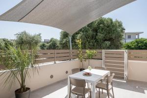 A balcony or terrace at Margiani Studio & Apartment
