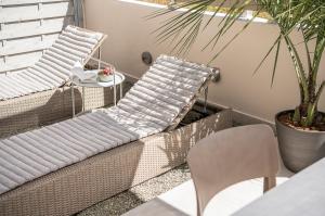 A seating area at Margiani Studio & Apartment