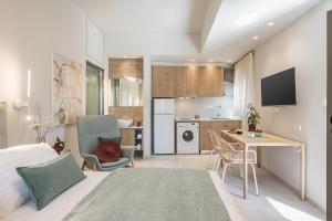 A kitchen or kitchenette at Margiani Studio & Apartment