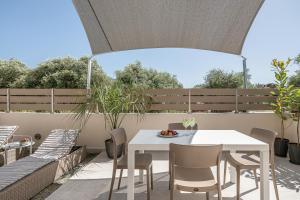 A balcony or terrace at Margiani Studio & Apartment