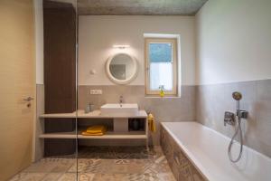Kylpyhuone majoituspaikassa Apartment Das Eckige