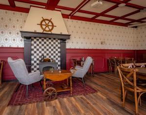 Posezení v ubytování Hotel 't Gemeentehuis