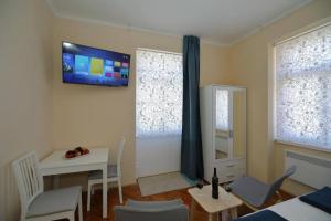 TV a/nebo společenská místnost v ubytování Studio Porty