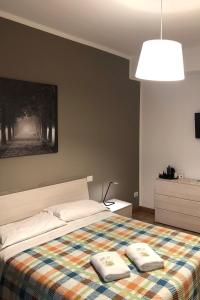 Postel nebo postele na pokoji v ubytování Guest House Brianza Room