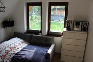 Posteľ alebo postele v izbe v ubytovaní Apartament Antolka