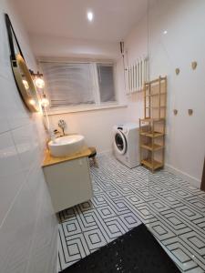 Koupelna v ubytování Apartament Flaming