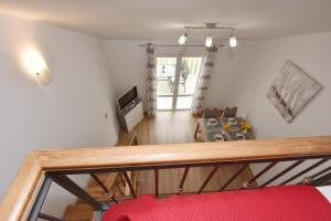 TV a/nebo společenská místnost v ubytování Apartments Lorena