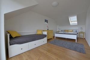Postel nebo postele na pokoji v ubytování Apartmán Ubytování De Donawitz - Dolní Dunajovice