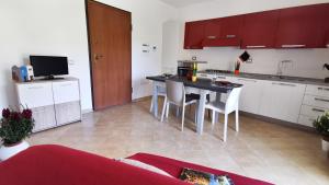Kuchyňa alebo kuchynka v ubytovaní Welcomely - La Terrazza sul Faro