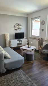 Χώρος καθιστικού στο Pension "Am Fischerweg"