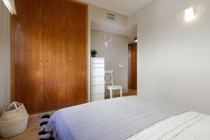 Posteľ alebo postele v izbe v ubytovaní Lets Holidays new apartment close to the beach