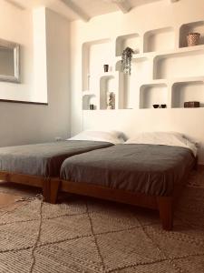 Ein Bett oder Betten in einem Zimmer der Unterkunft Casa Pepita