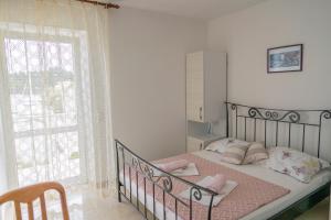 Krevet ili kreveti u jedinici u objektu Guesthouse Kamarin