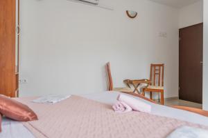 Postel nebo postele na pokoji v ubytování Guesthouse Kamarin
