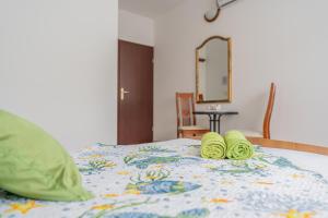 Postel nebo postele na pokoji v ubytování Guesthouse Kamarin
