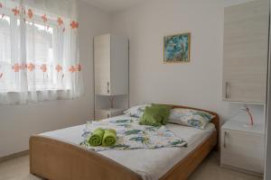 Postel nebo postele na pokoji v ubytování Guesthouse Kamarin