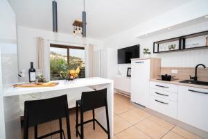 Kuchyň nebo kuchyňský kout v ubytování Apartment IVA Studio