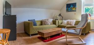 Μια τηλεόραση ή/και κέντρο ψυχαγωγίας στο Ferienwohnung Ziegelbergsweg