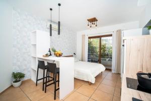 Postel nebo postele na pokoji v ubytování Apartment IVA Studio