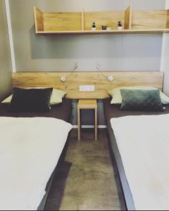 Postel nebo postele na pokoji v ubytování Mobilehome Ive u. Slavka