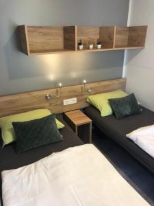 Postel nebo postele na pokoji v ubytování Mobilehome Ive u. Slavka