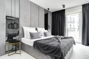 Posteľ alebo postele v izbe v ubytovaní EL Apartments - Aries