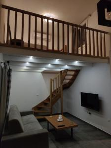 TV a/nebo společenská místnost v ubytování Villa Ageri