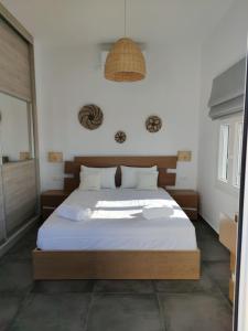 Postel nebo postele na pokoji v ubytování Villa Ageri