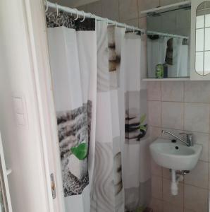 Kúpeľňa v ubytovaní Relax time Vidéken
