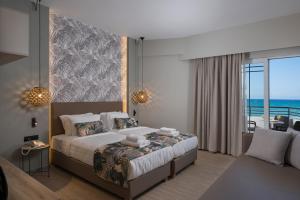 Postel nebo postele na pokoji v ubytování Mare Blue Suites