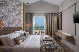 Postel nebo postele na pokoji v ubytování Mare Blue Suites