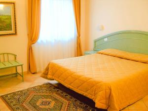 Posteľ alebo postele v izbe v ubytovaní La Bastia Hotel & Resort + 33 fotografií