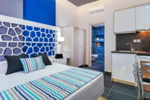A bed or beds in a room at El Mare Seaside Retreats - Bespoke Luxury Getaways