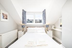 Postel nebo postele na pokoji v ubytování Cragwood Guesthouse