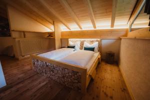 Postel nebo postele na pokoji v ubytování Chalet Passeier - ZOLL