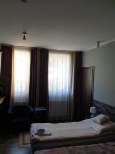 Posteľ alebo postele v izbe v ubytovaní Noclegi nad Morzem u Kasi