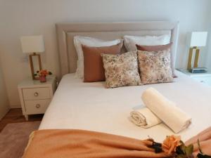 Postel nebo postele na pokoji v ubytování Apartment PURO HOMES