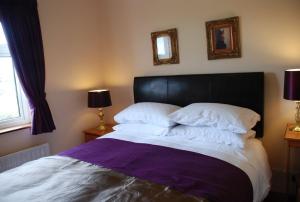 Postelja oz. postelje v sobi nastanitve Coill an Rois B&B