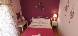 Posteľ alebo postele v izbe v ubytovaní Iris Deluxe Suites 1